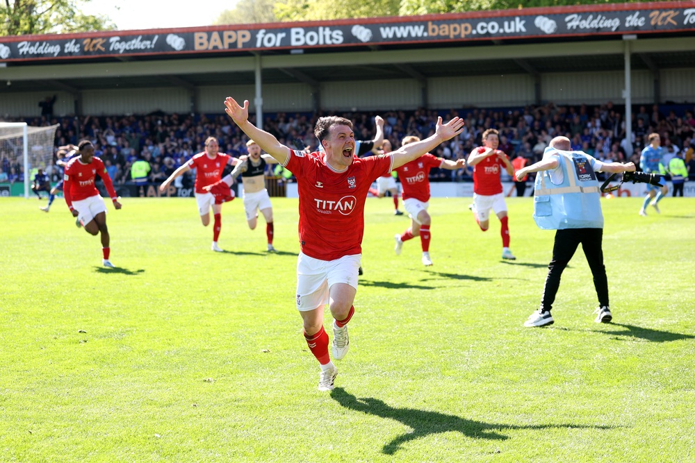 York celebrate after scoring a last-gasp equaliser to seal the National League title (Getty)
