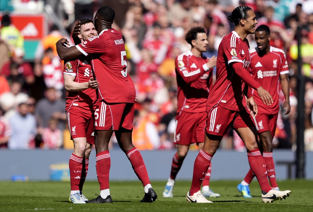 Andy Robertson, left, enjoyed his goal (PA) (PA Wire)