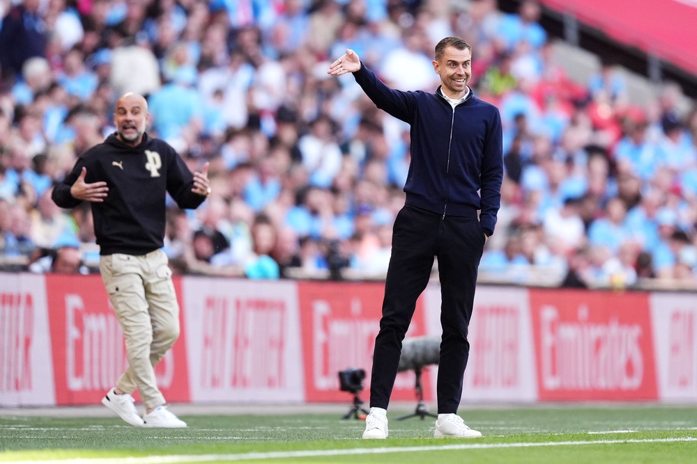 Tonda Eckert directs from the touchline (PA)