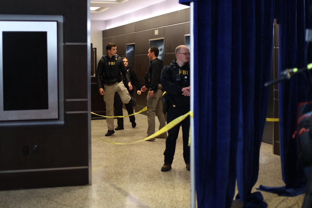 FBI agents are seen at the Washington Hilton after shots were fired (AFP/Getty)