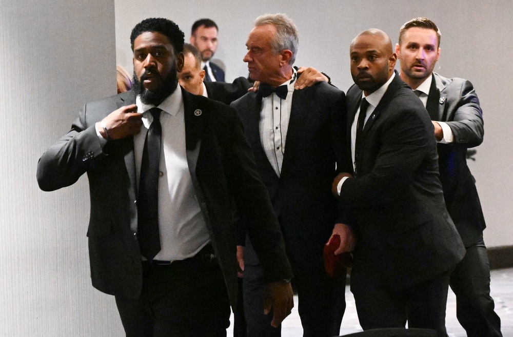 US Secretary of Health and Human Services Robert F. Kennedy Jr. is rushed out by Secret Service after shots were fired (AFP/Getty)