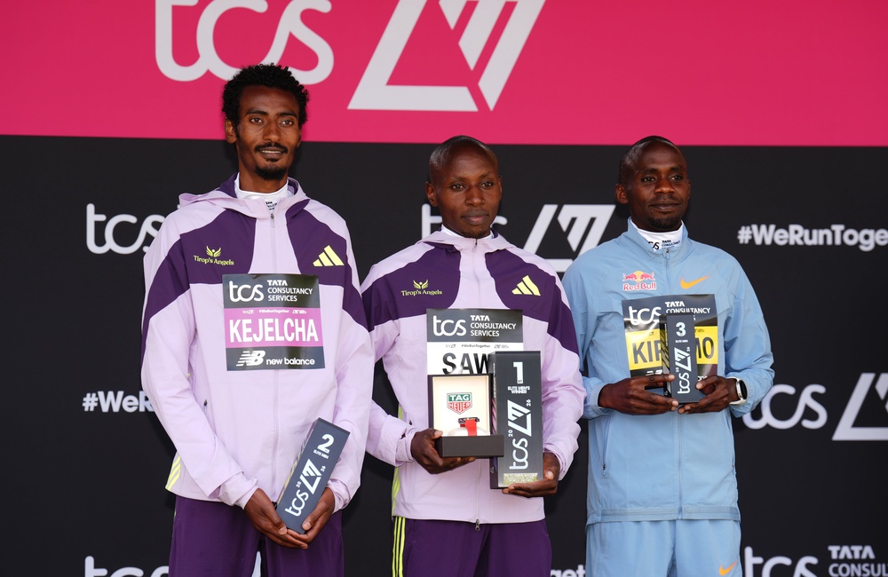 Sabastian Sawe, centre, Yomif Kejelcha, left, and Jacob Kiplimo, right, on the London Marathon podium (John Walton/PA) (PA Wire)