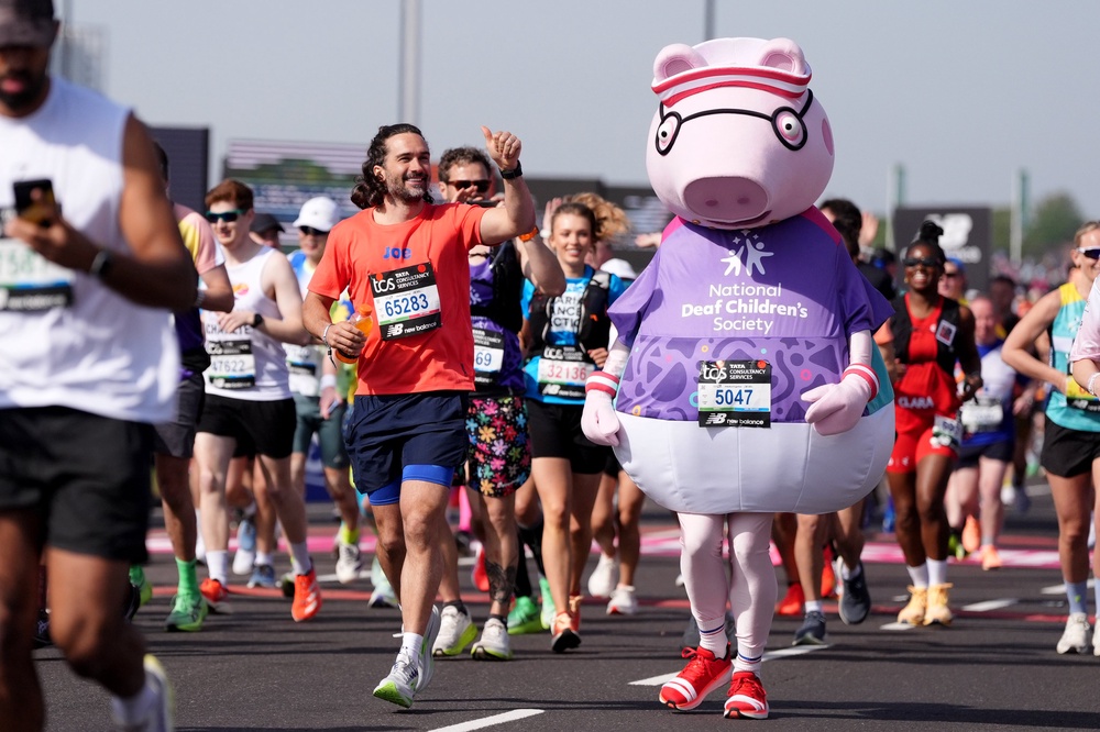 Joe Wicks and Daddy Pig ran as training partners (Ben Whitley/PA) (PA Wire)