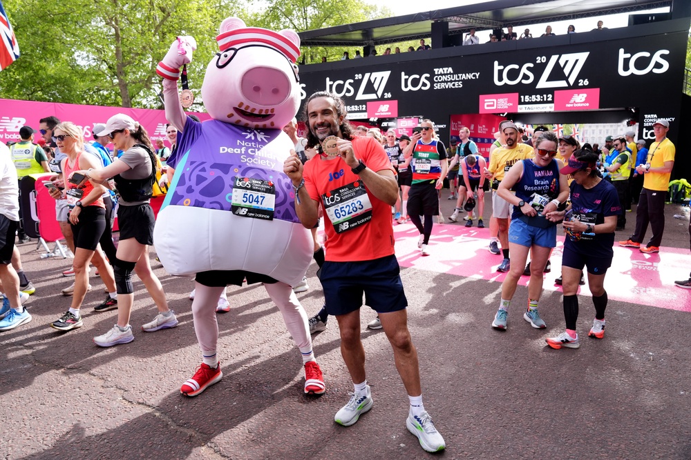 Joe Wicks and Daddy Pig after finishing the 2026 TCS London Marathon (John Walton/PA) (PA Wire)