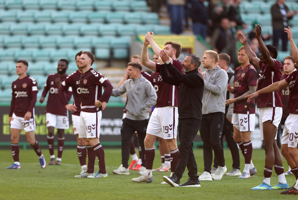 There were delirious scenes as Hearts celebrated victory at rivals Hibs (Getty)