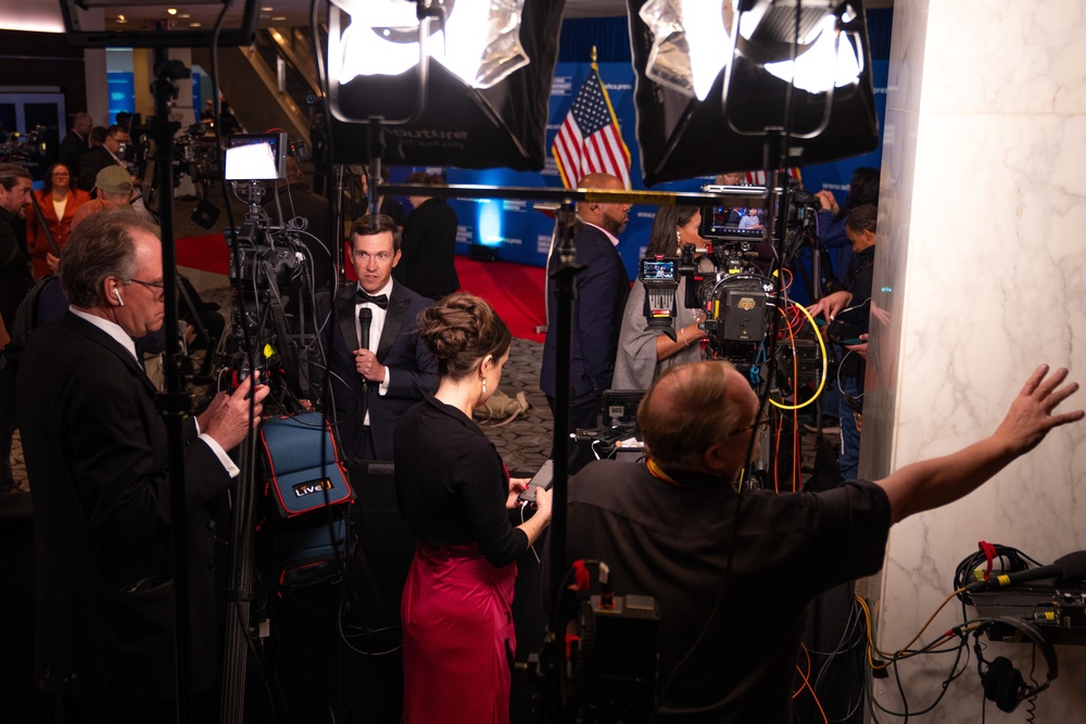 The journalists captured images, recorded interviews and maintained open lines to describe the scene to off-site colleagues (AP Photo/Allison Robbert)