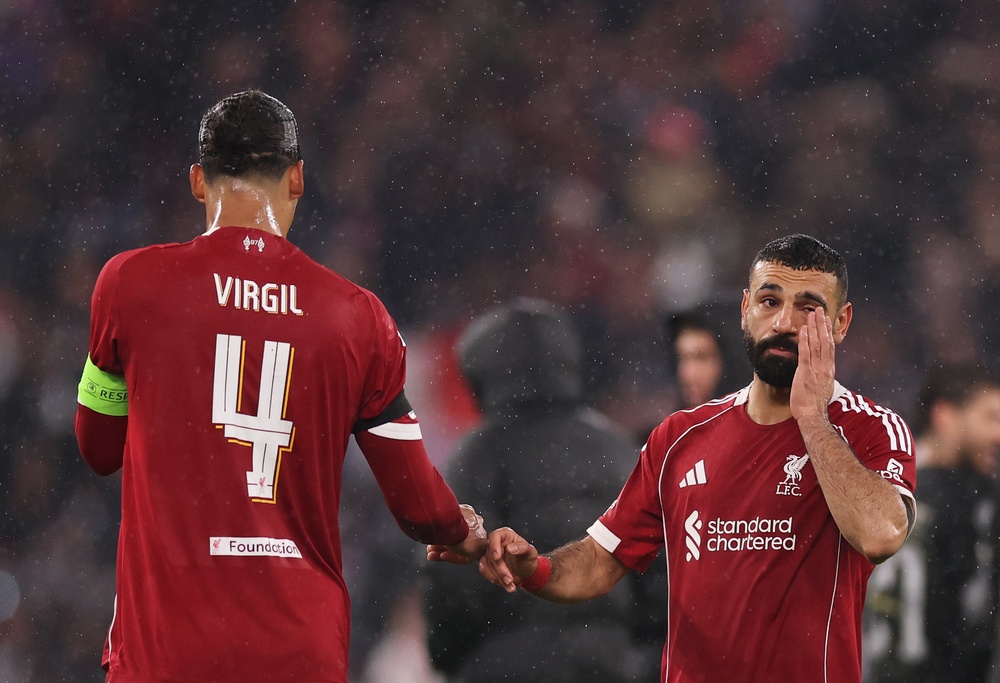 Mohamed Salah (right) is a doubt for the rest of the season (Getty)