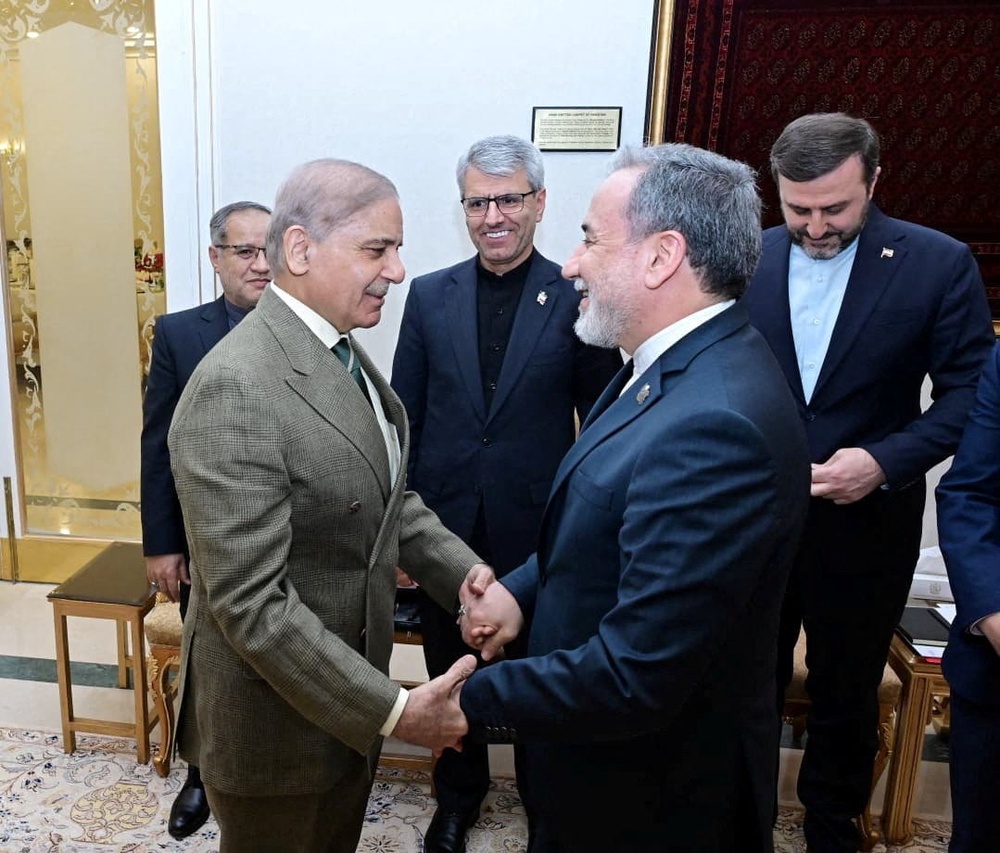 Pakistani prime minister Shehbaz Sharif meets with Iranian foreign minister Abbas Araqchi in Islamabad (Reuters)