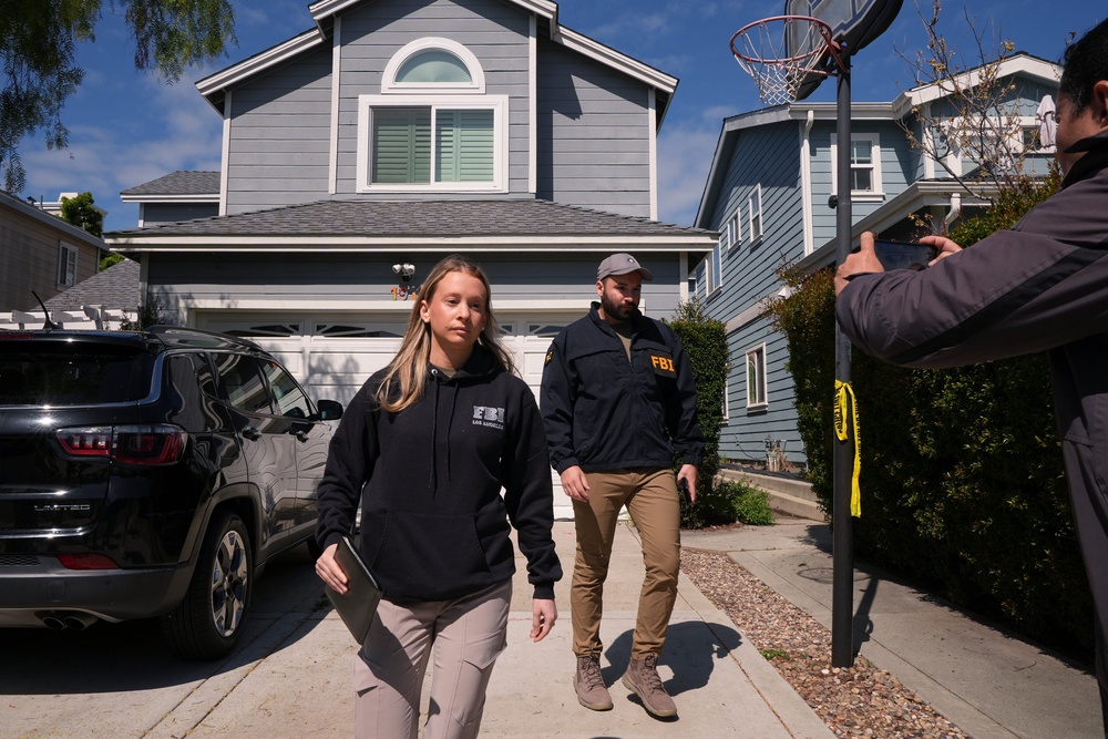FBI agents walked door-to-door in the neighborhood where Cole Tomas Allen lived to question neighbors about the suspected shooter (AP)