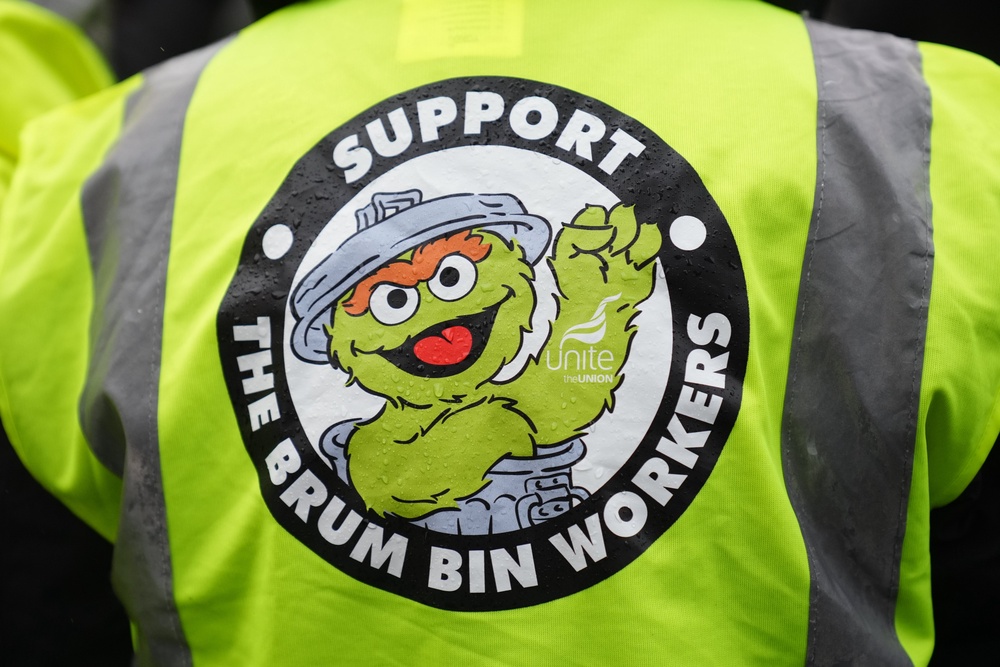 A worker on the picket line (PA) (PA Wire)