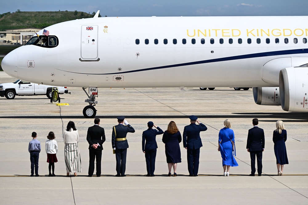 Greeters stand on the tarmac after Britain's King Charles III and Britain's Queen Camilla's plane landed at Joint Base Andrews, Maryland, on April 27, 2026. (AFP/Getty)