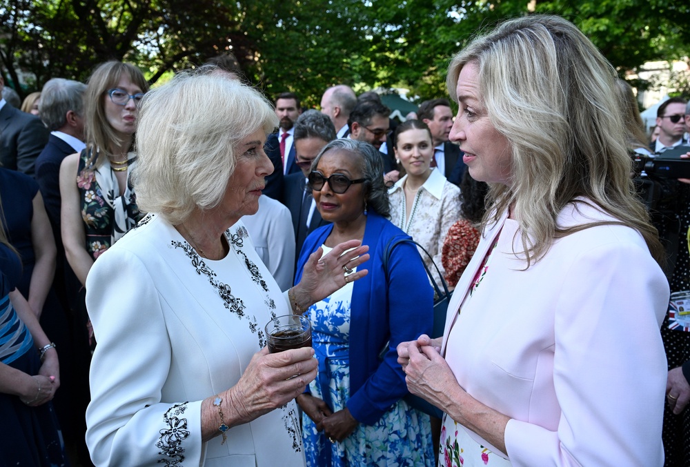 Queen Camilla greets Michelle DeLaune, CEO of the National Center for Missing & Exploited Children, at the garden party (Getty)
