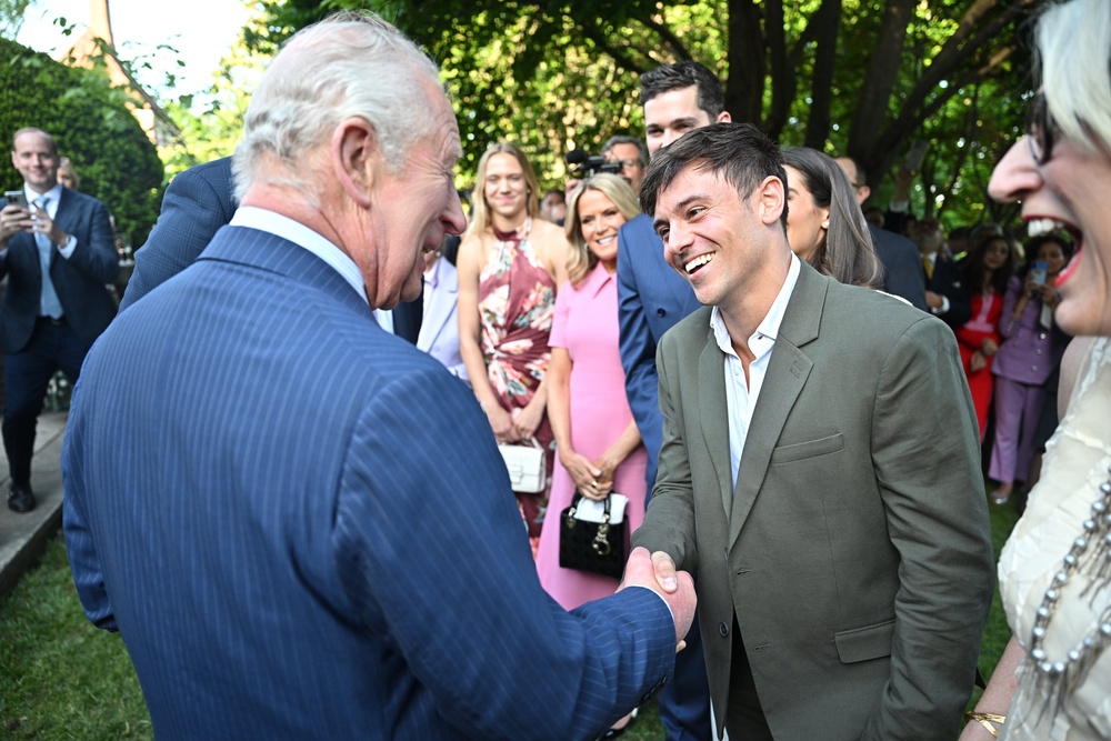 Charles meets former diver Tom Daley during the garden party (Samir Hussein/PA) (PA Wire)