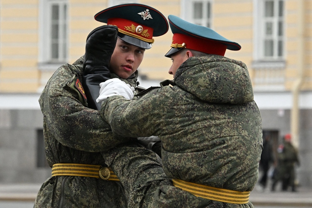 Russian honour guards soldiers get ready for a rehearsal for the Victory Day military parade at Dvortsovaya Palace Square in Saint Petersburg (AFP/Getty)