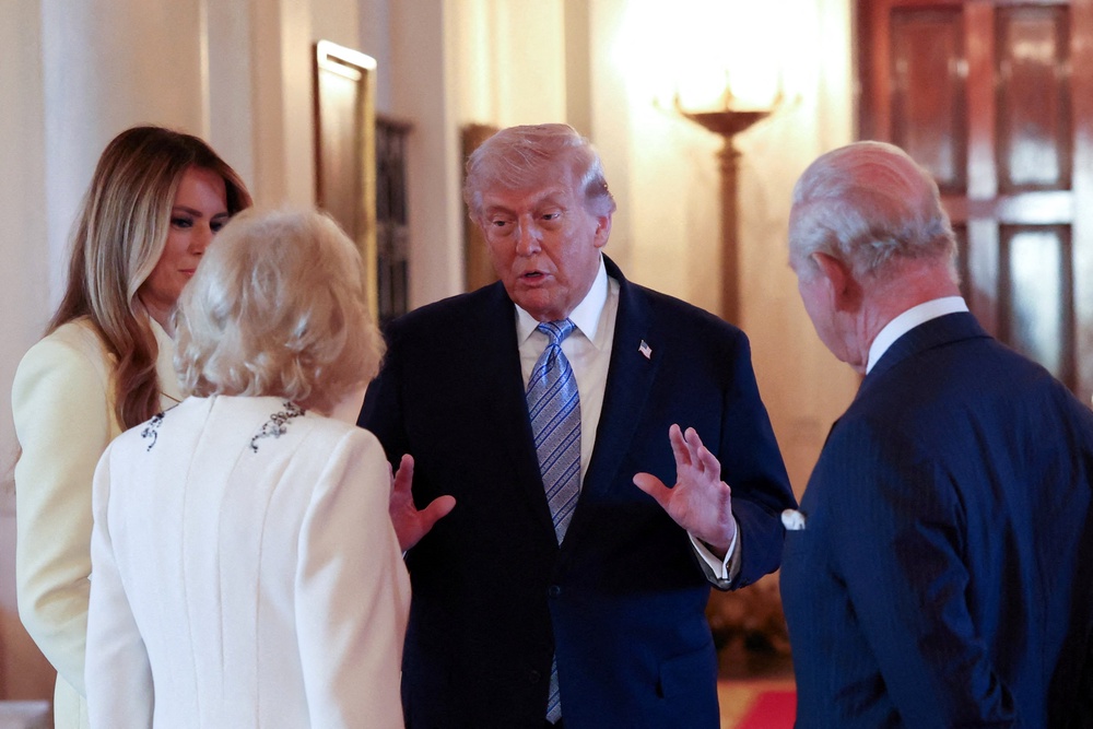 Queen Camilla (C/L), King Charles III (R) and US First Lady Melania Trump (L) listen to US President Donald Trump on Monday (AFP/Getty)