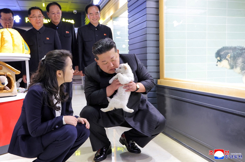 Kim Jong Un visits the Hwasong Pet Shop accompanied by his daughter Kim Ju Ae in Pyongyang (Reuters)