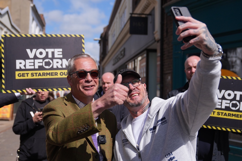 The party’s mantra took direct aim at the prime minister, telling the electorate: ‘Vote Reform. Get Starmer out’ (PA)