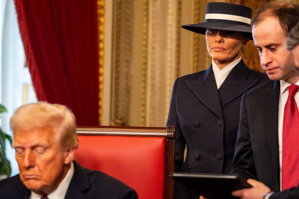 Melania wore a buttercream skirt suit by Adam Lippes during the British royals' visit, with Lippes previously dressing her in a navy coat for her husband's inauguration (AFP/Getty)