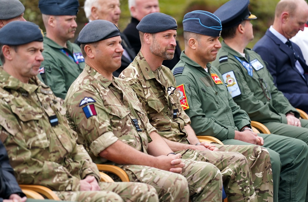 The Prince of Wales watches the 85th anniversary parade (Dominic Lipinski/PA)