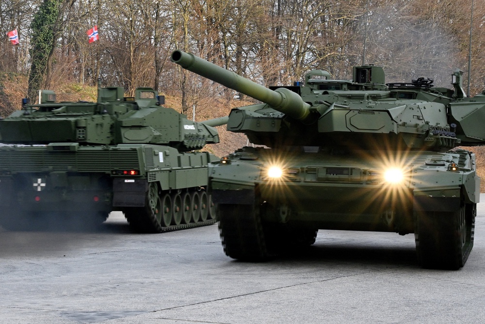 New Leopard 2A8 tanks operate during their rollout at KNDS in Munich, Germany, November 19, 2025 (Reuters)