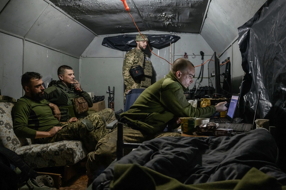 Members of the 3rd Army Corps interception squadron monitor for Russian drone activity near the front lines of eastern Ukraine in October 2025 (AFP/Getty)
