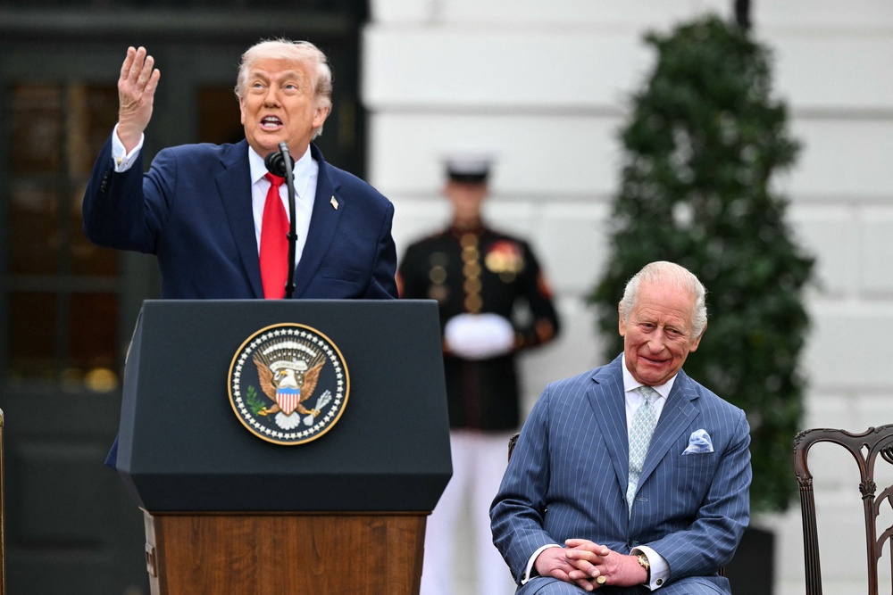 ‘That's a record we won't be able to match, darling,’ President Donald YTrump joked to his wife, Melania, as King Charles looked on at the White House Tuesday. (AFP/Getty)
