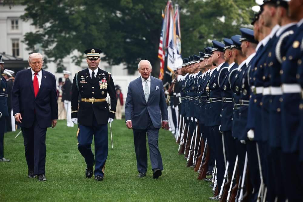 The president and the King inspecting members of the US armed forces (Henry Nicholls/PA) (PA Wire)