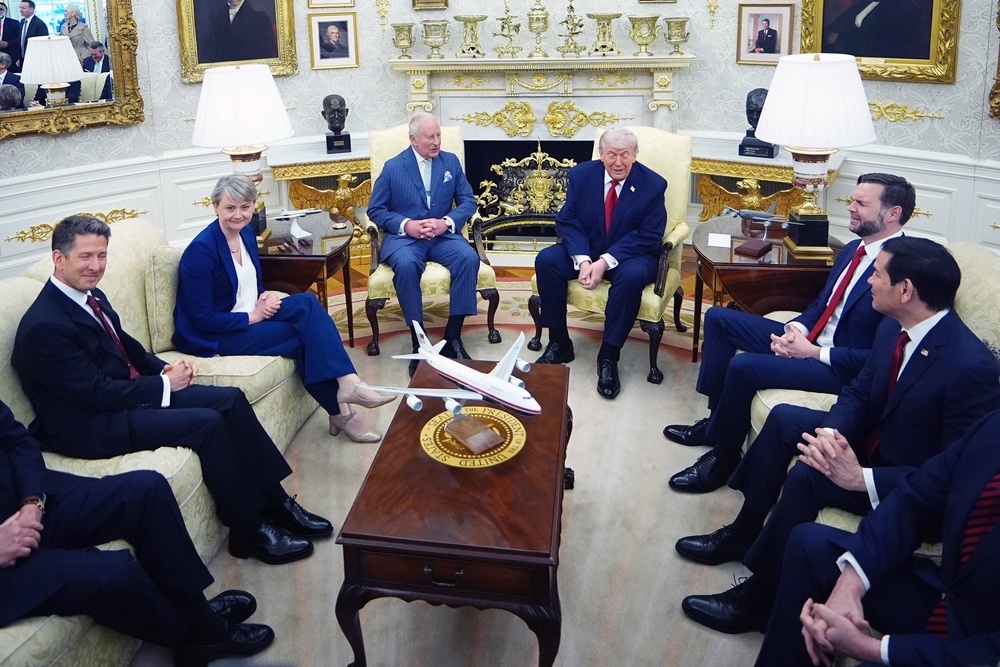The King, President Donald Trump and aides in the Oval Office (Chris Jackson/PA) (PA Wire)
