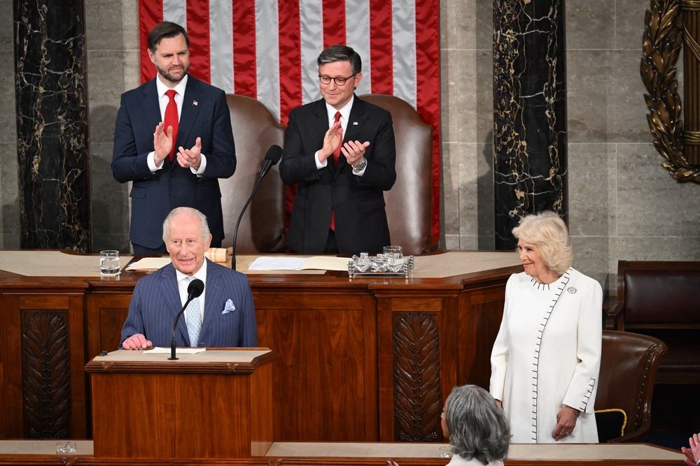 House Speaker Mike Johnson, US Vice President JD Vance and Queen Camilla applaud the King (AFP/Getty)