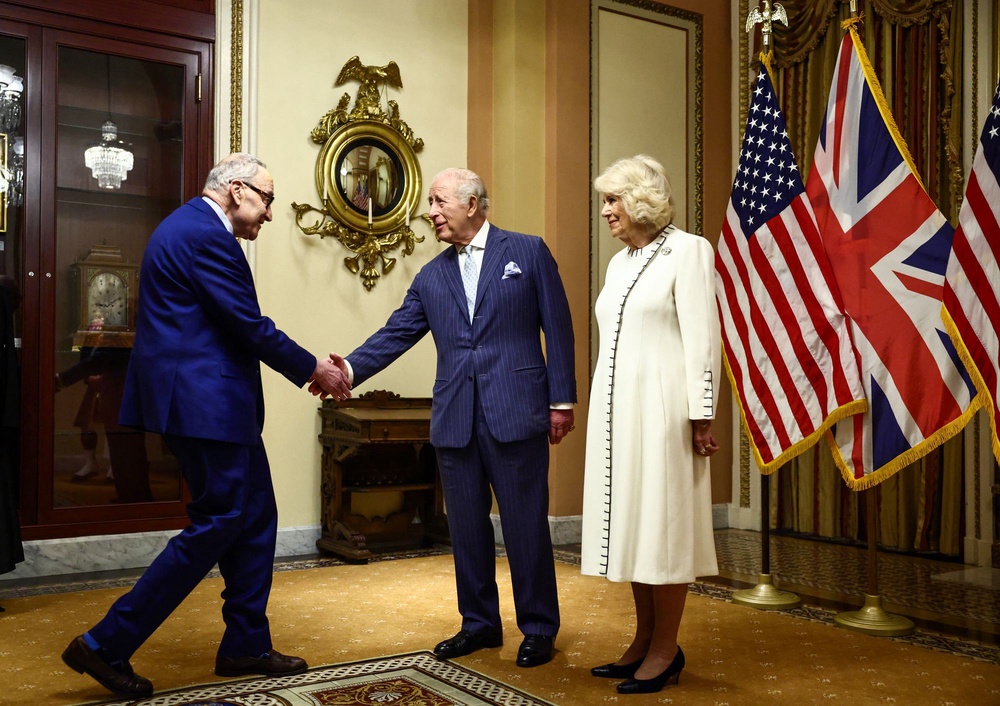 Senate Minority Leader Chuck Schumer greets King Charles III and Queen Camilla (POOL/AFP via Getty Images)