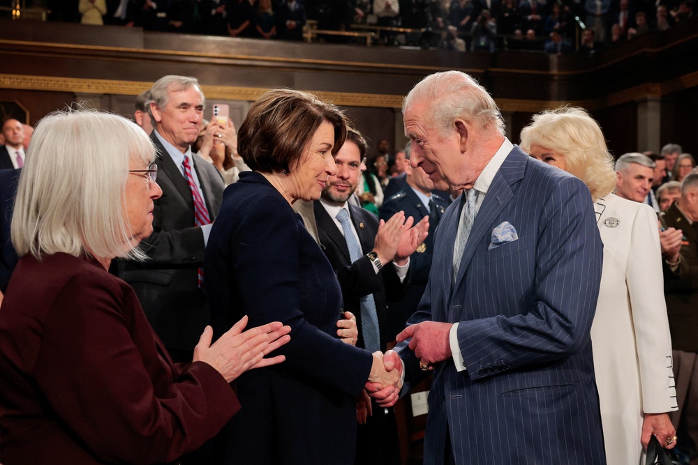 King Charles shakes the hand of U.S. Senator Amy Klobuchar (Reuters)