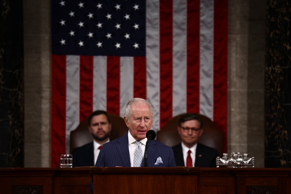 King Charles gives his address to both chambers of Congress as Vice President JD Vance (left) and U.S. Speaker of the House Mike Johnson (right) listen (Getty)