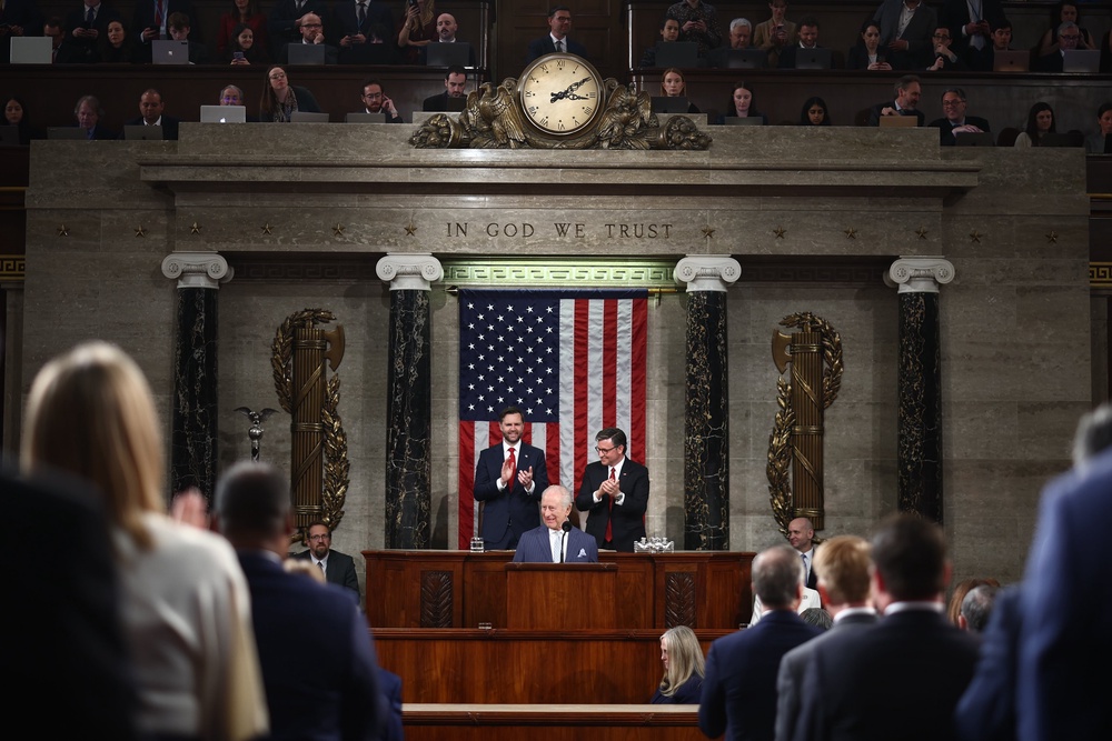 US Vice President JD Vance and House Speaker Mike Johnson applaud as King Charles III arrives to address members of the US House of Representatives and the US Senate (PA Wire)