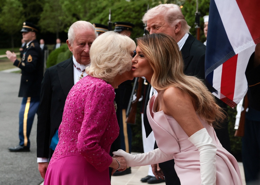First lady Melania Trump greets Queen Camilla at the White House (REUTERS)