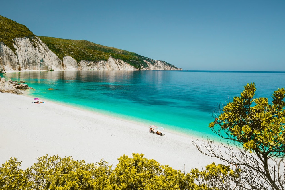 Fteri Beach can be reached by hiking down a trail or via boat (Getty Images/iStockphoto)