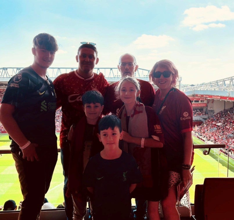 The family enjoying a day out at Liverpool’s Anfield stadium to watch a football match (Collect/PA Real Life)