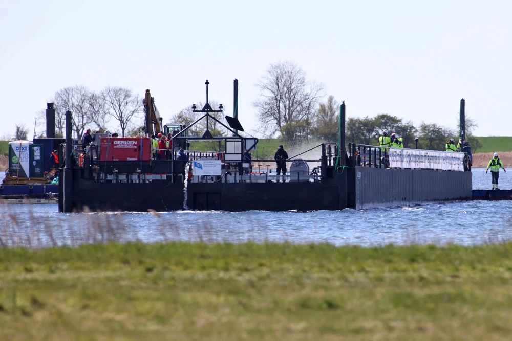 Timmy was dragged onto a special barge designed for carrying ships (AFP/Getty)