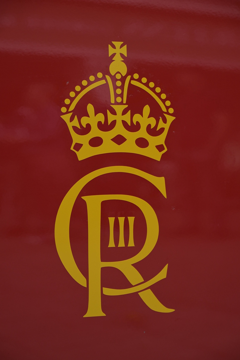 The King’s cypher features his initial C and the Roman numeral III to signify his title (Royal Mail/PA) (PA Media)