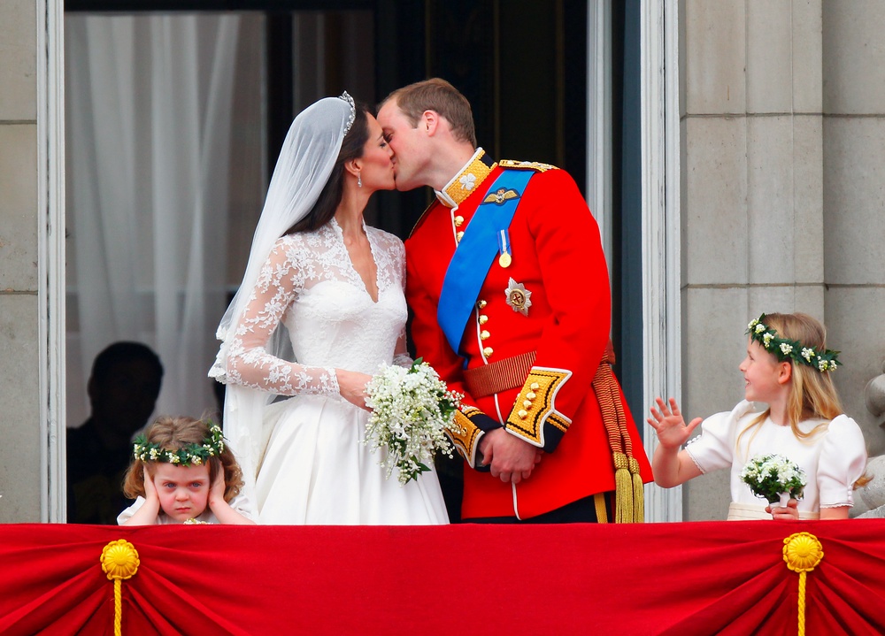 William and Kate kiss on the balcony of Buckingham Palace on their wedding day 15 years ago (Chris Ison/PA) (PA Archive)