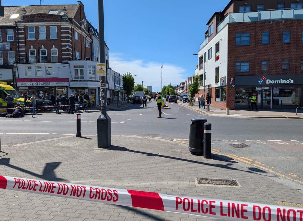 Police officers at the scene in Golders Green (PA) (PA Wire)