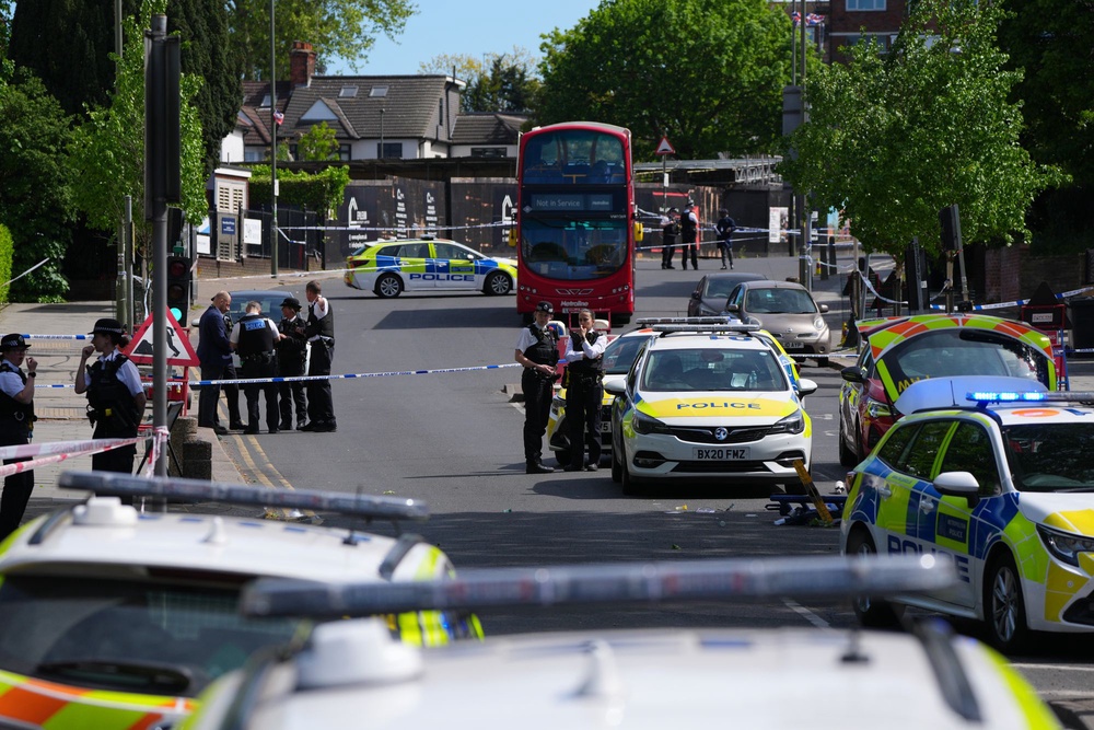 Numerous police cars were in the road, which was cordoned off (Getty)