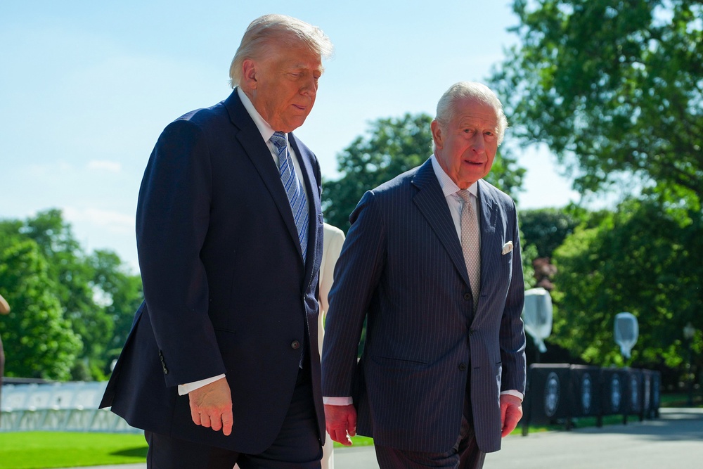 King Charles walks with Trump on the South Lawn of the White House as he arrives for tea on day one of a State Visit to the United States of America, on April 27, 2026 in Washington, DC (Getty Images)