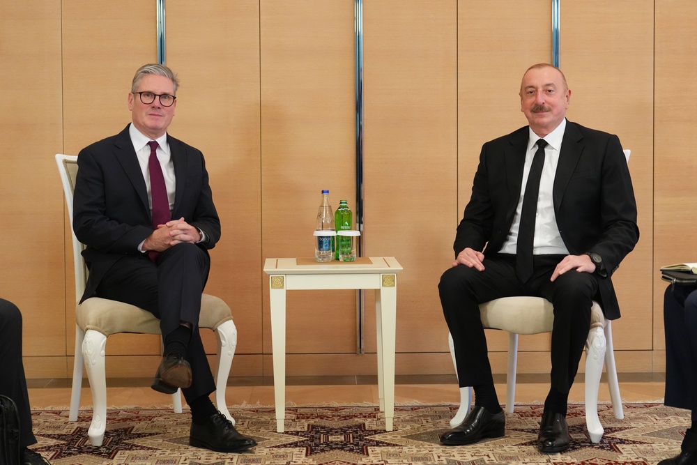 Keir Starmer with Azerbaijan president Ilham Aliyev at COP29 in 2024. The government faces calls to condition cooperation with the regime on marked human rights improvements (Getty)