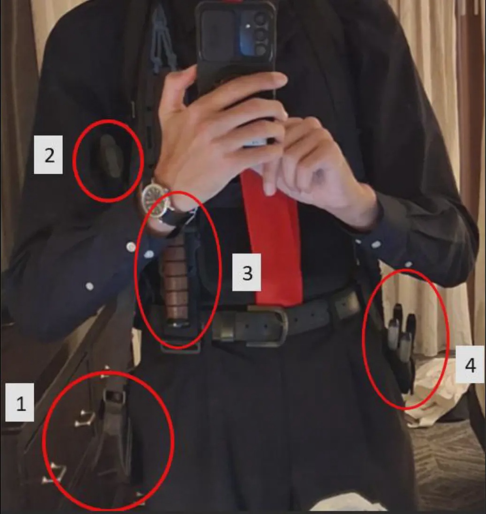 Allen allegedly had two guns and multiple knives on him in the photo, along with additional ammunition, pliers and wire cutters (U.S. Department of Justice)
