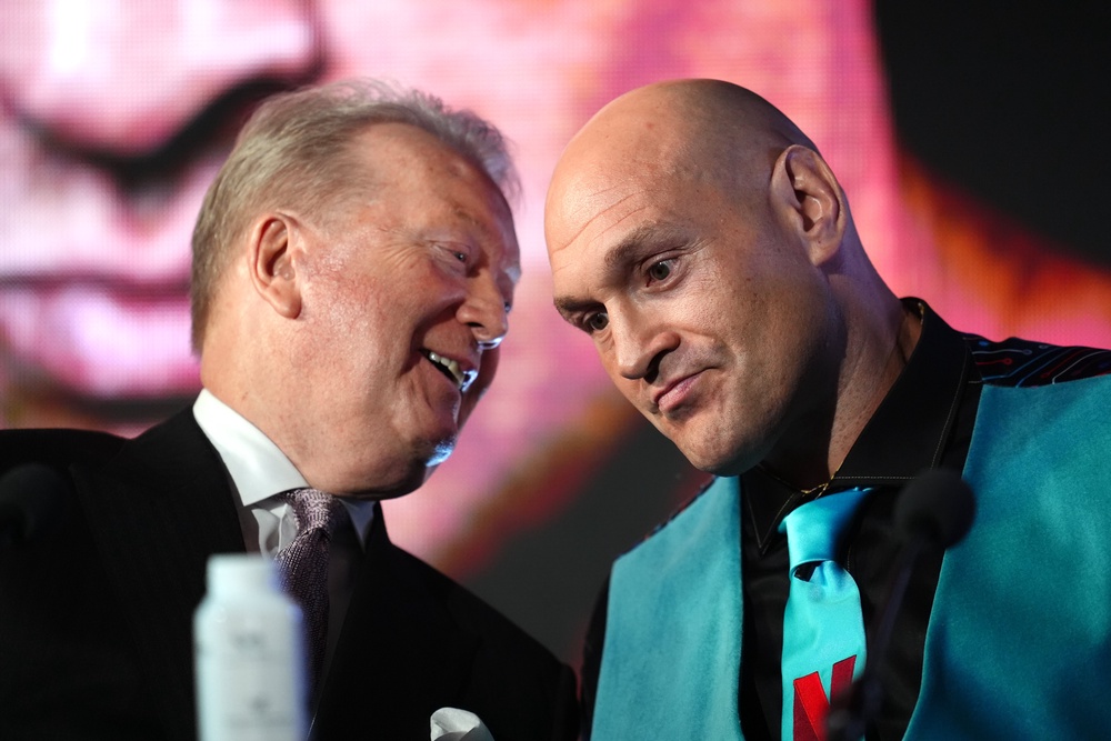 Boxing promoter Frank Warren (left) wants to see Tyson Fury (right) face Anthony Joshua at Wembley (Adam Davy/PA) (PA Wire)