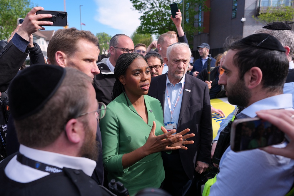 Tory leader Kemi Badenoch speaking to members of the public in Golders Green (AP)
