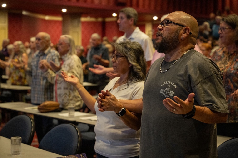 Some parishioners travel up to an hour and a half each week to attend Mass, often coming as families (Montie Chavez)