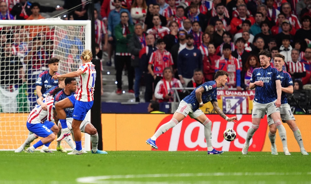 White's trailing arm allowed Atletico back into it as he conceded a penalty in the second half (PA)