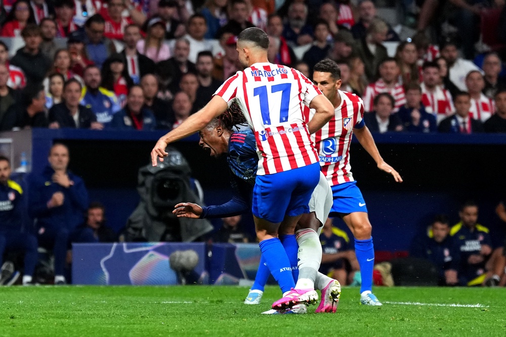 Eze goes down following contact from Hancko. (Getty Images)