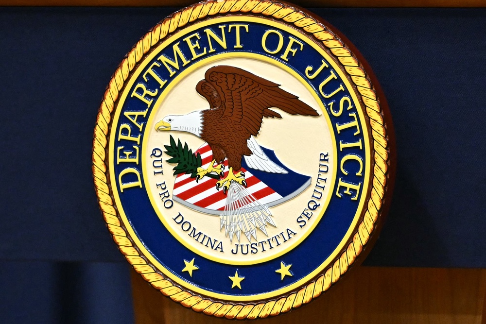 The Justice Department filed the suits on Wednesday in U.S. district courts in the respective states (Mandel Ngan/AFP via Getty Images)